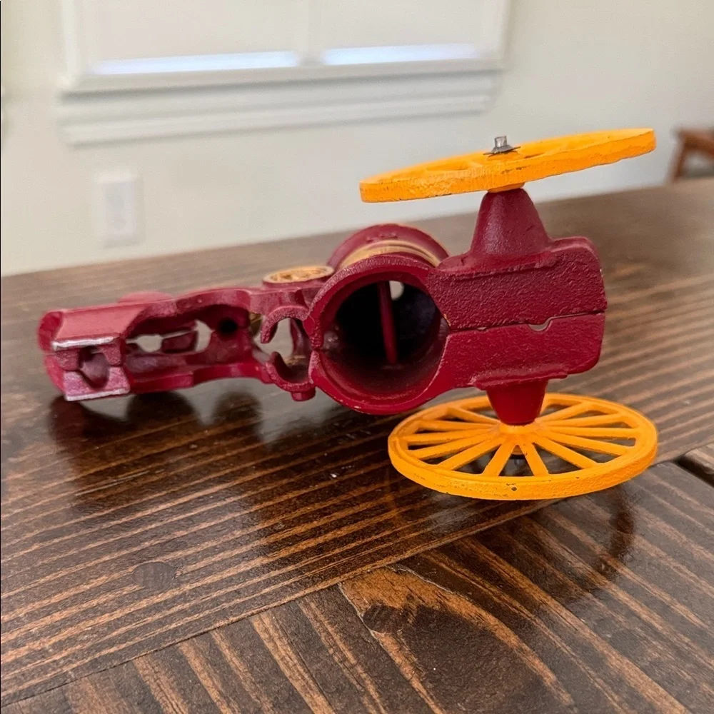 Vintage Red and Gold Toy Fire Pumper Wagon